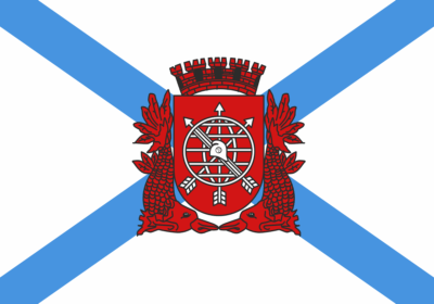 The flag of rio de janeiro, featuring a blue saltire behind the city's coat of arms (in red) in the centre