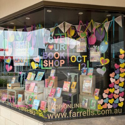 a photo of Farrells front window, featuring colourful hearts