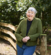 a portrait of Lynn Jenner, an older woman wearing a green cardigan