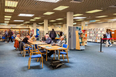 Interior of Dublin Central Library, with people reading