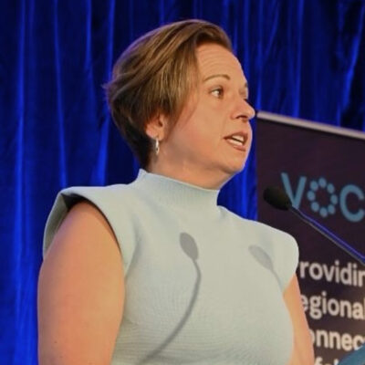Photo of attorney-general Michelle Rowland speaking at a conference.