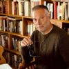 Photo of author Stan Grant in his tsudy.
