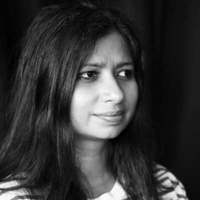 Black and white photo of author Neha Kale.